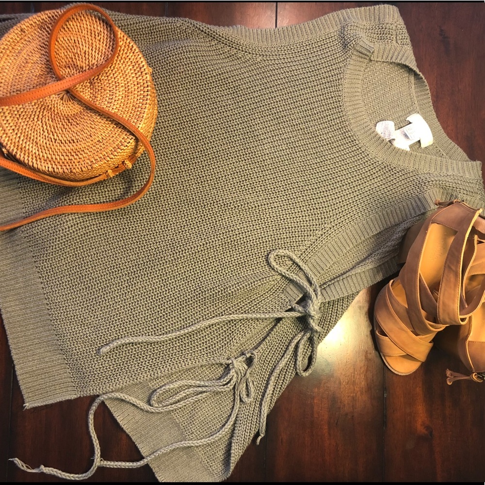 green knitted top